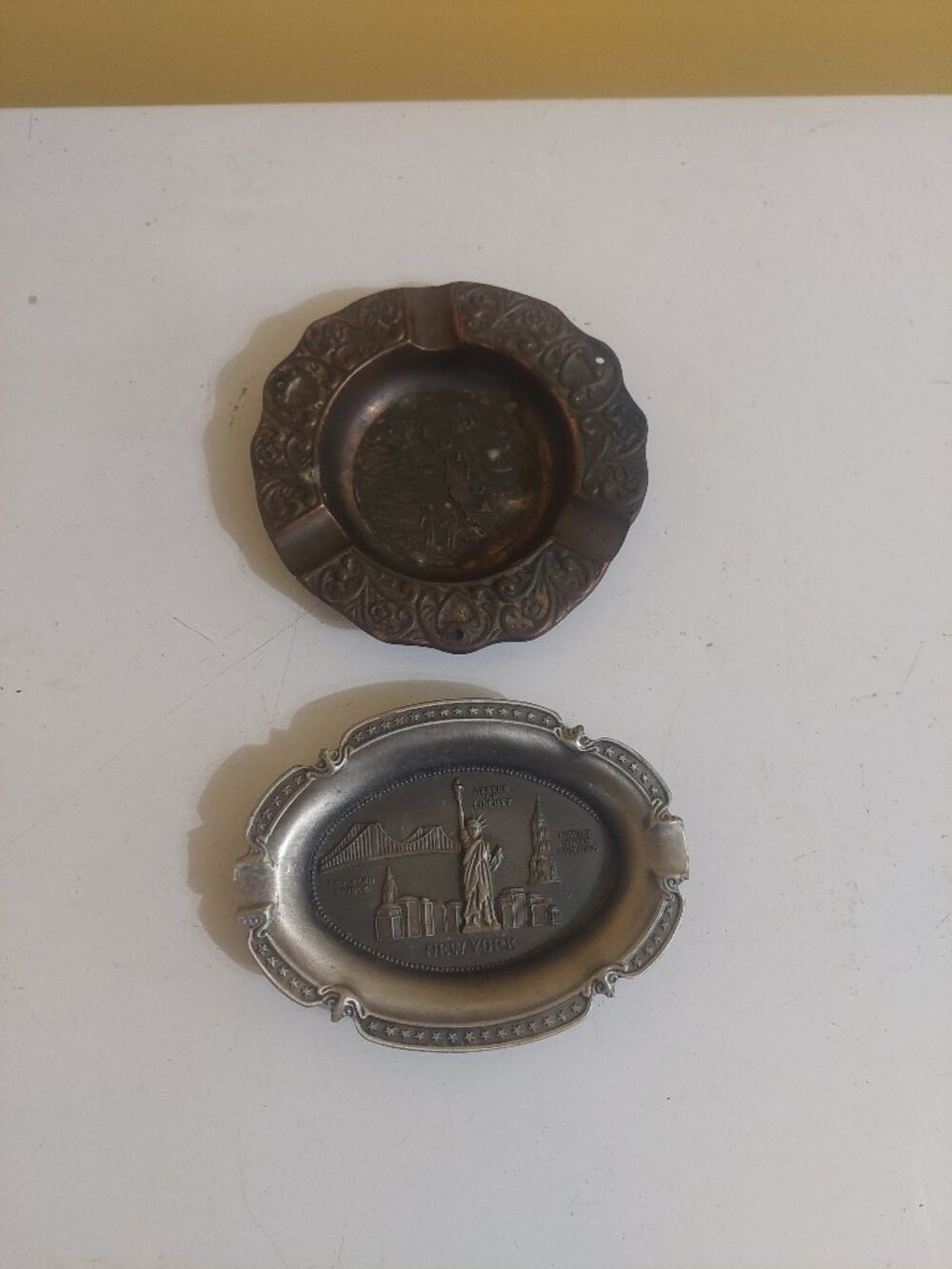 2 Vintage Florida & New York Metal Ashtrays. The Florida ashtray was Made in USA